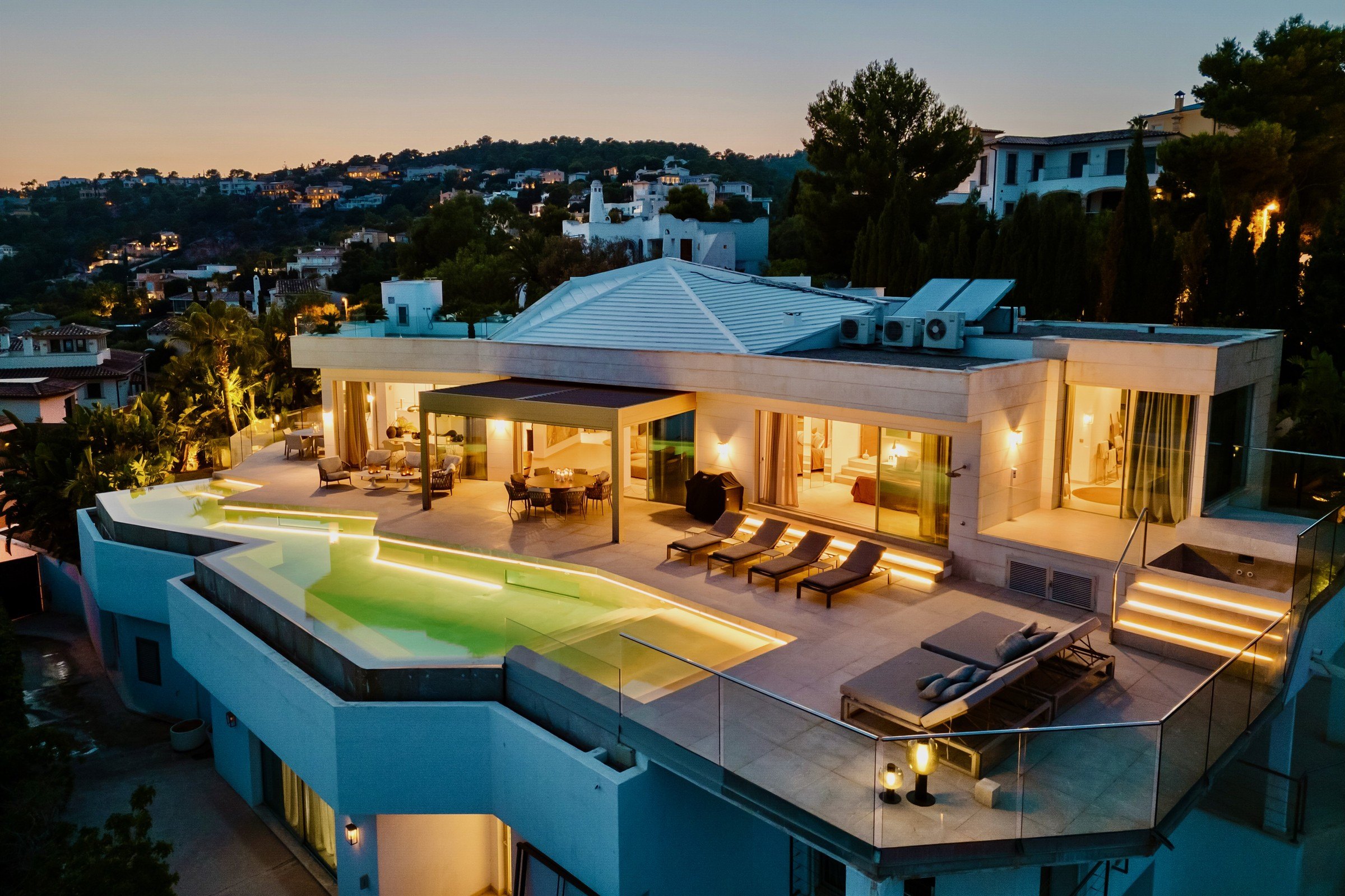 A sea-view villa above Port d'Andratx at dusk